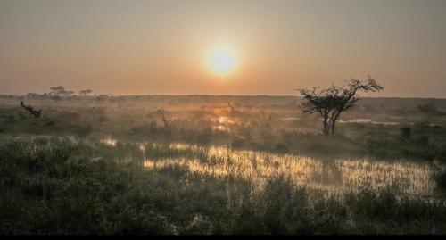 Sun rising over the Mugie dam